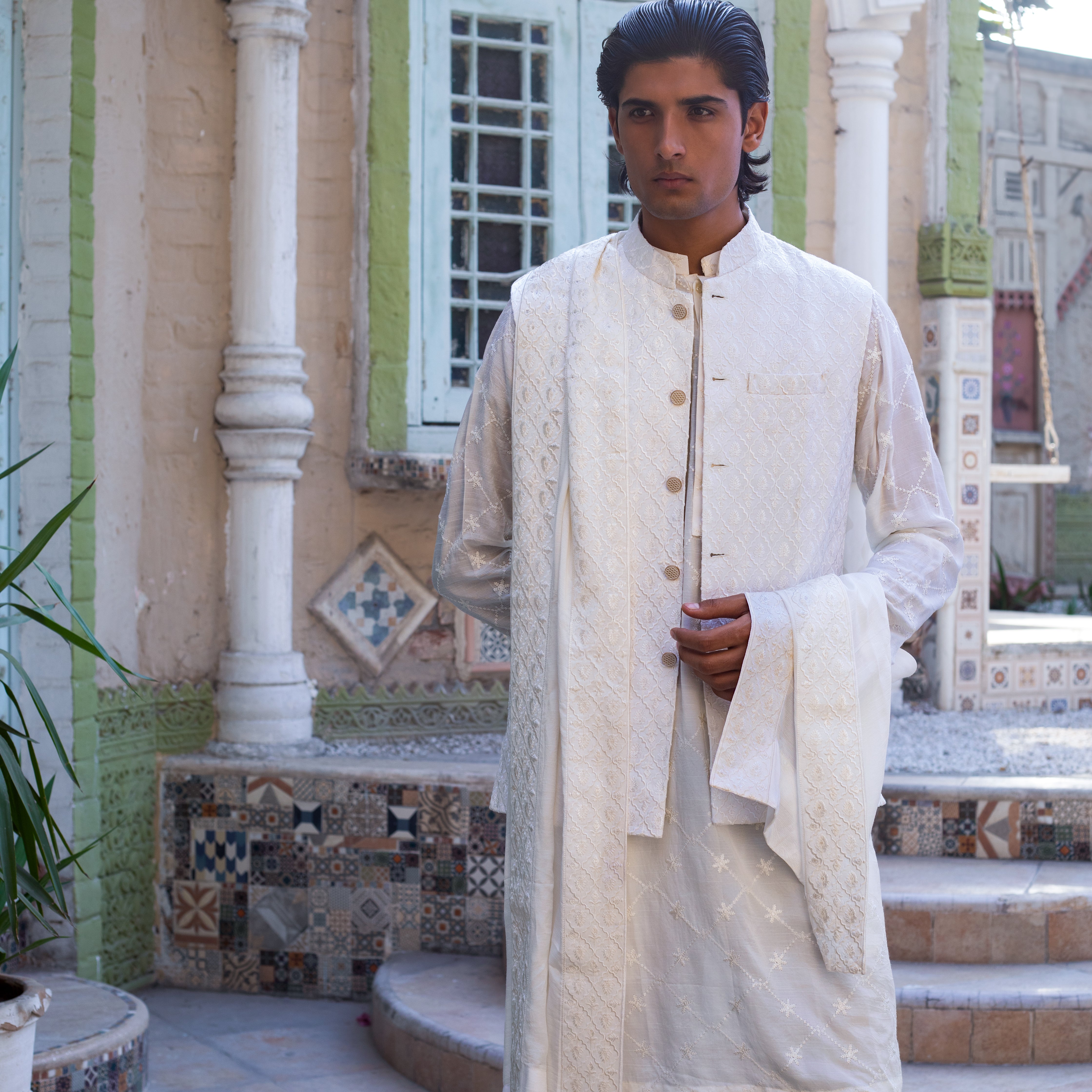 Arsalan Iqbal Nukta-e-Nazar Upper Body Medium Shot White Embroidered Waistcoat Kurta Set with Draped Shawl for Men
