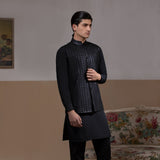 Arsalan Iqbal Sooch'2026 Jet Black Mirror Sequin Waistcoat with Kurta & Pyjama Set Thigh-Length Side Angle View for Men