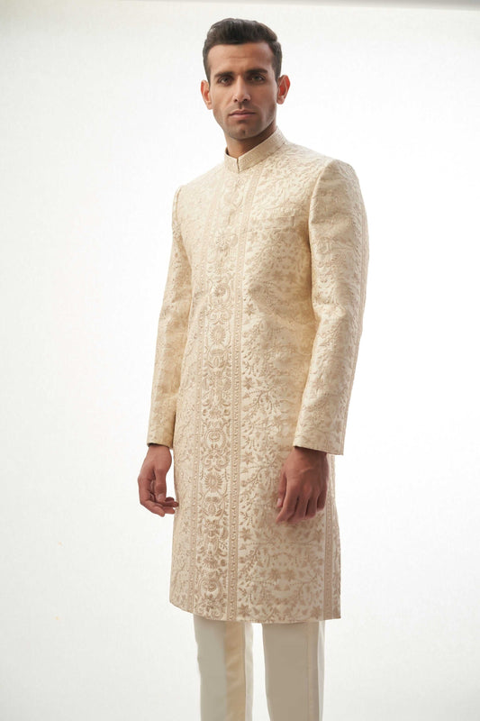 Fawn Persian Painting-Inspired Sherwani – Exquisite fawn-colored sherwani with intricate Persian painting-inspired embroidery for a royal look.