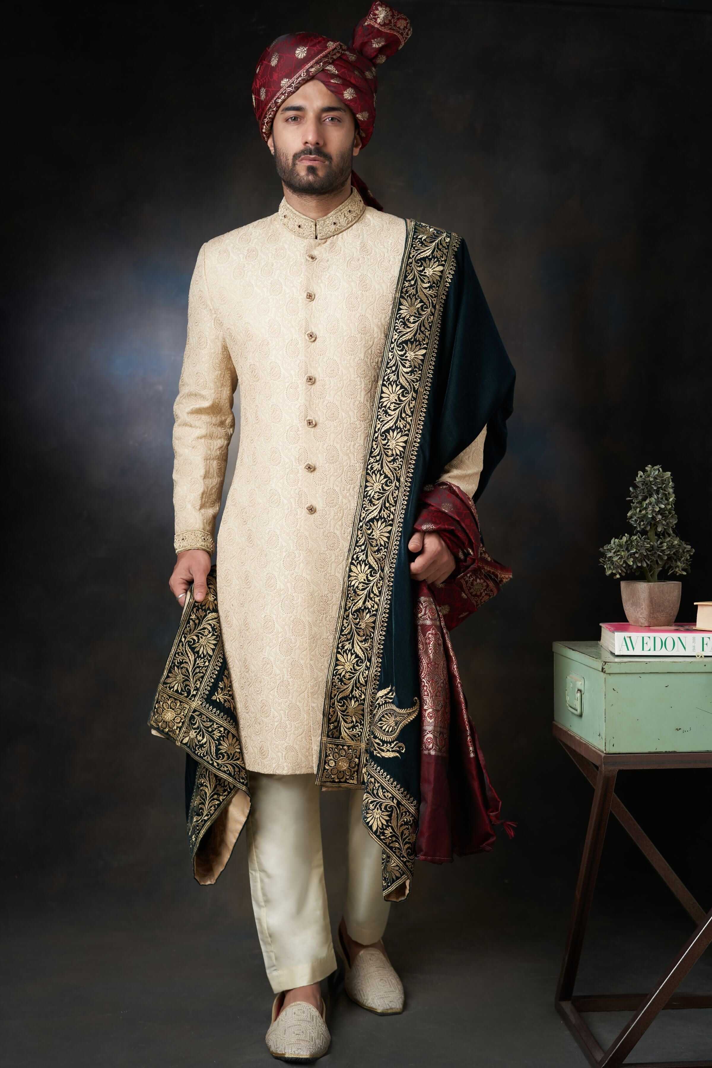 Gold Paisleys Rawsilk Sherwani with Velvet Shawl & Zardozi Adornments, Regal Wedding Attire.