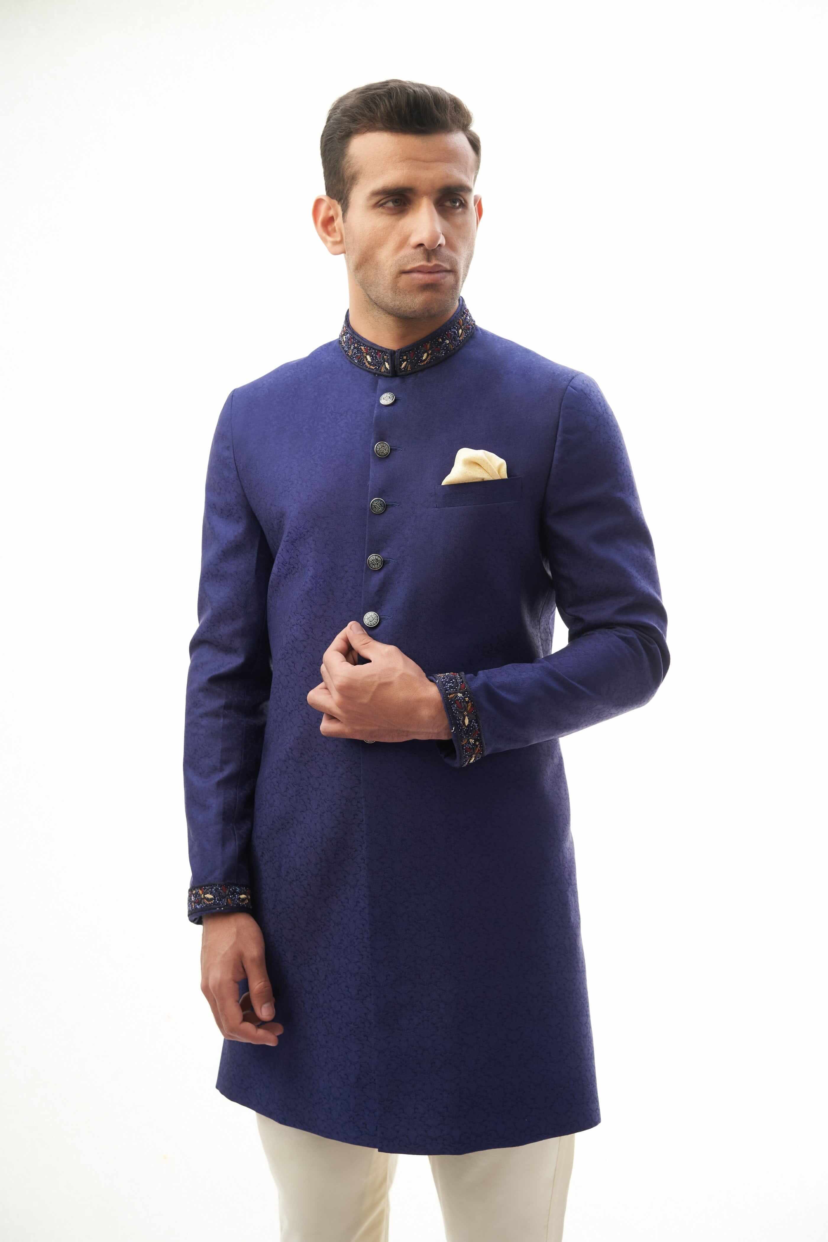 Navy Blue Brocade Silk Sherwani with Intricate Embroidery, Ideal for Weddings and Formal Events.