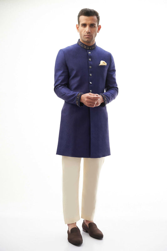 Navy Blue Brocade Silk Sherwani with Intricate Embroidery, Ideal for Weddings and Formal Events.