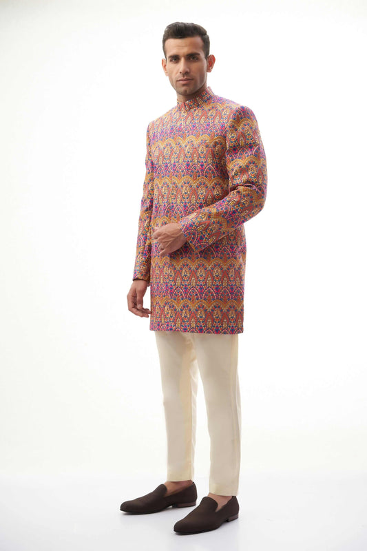 Rangeen-iye-Naubahar Multi-Colored Sherwani – Vibrant multi-colored sherwani featuring intricate designs for a traditional yet modern look.