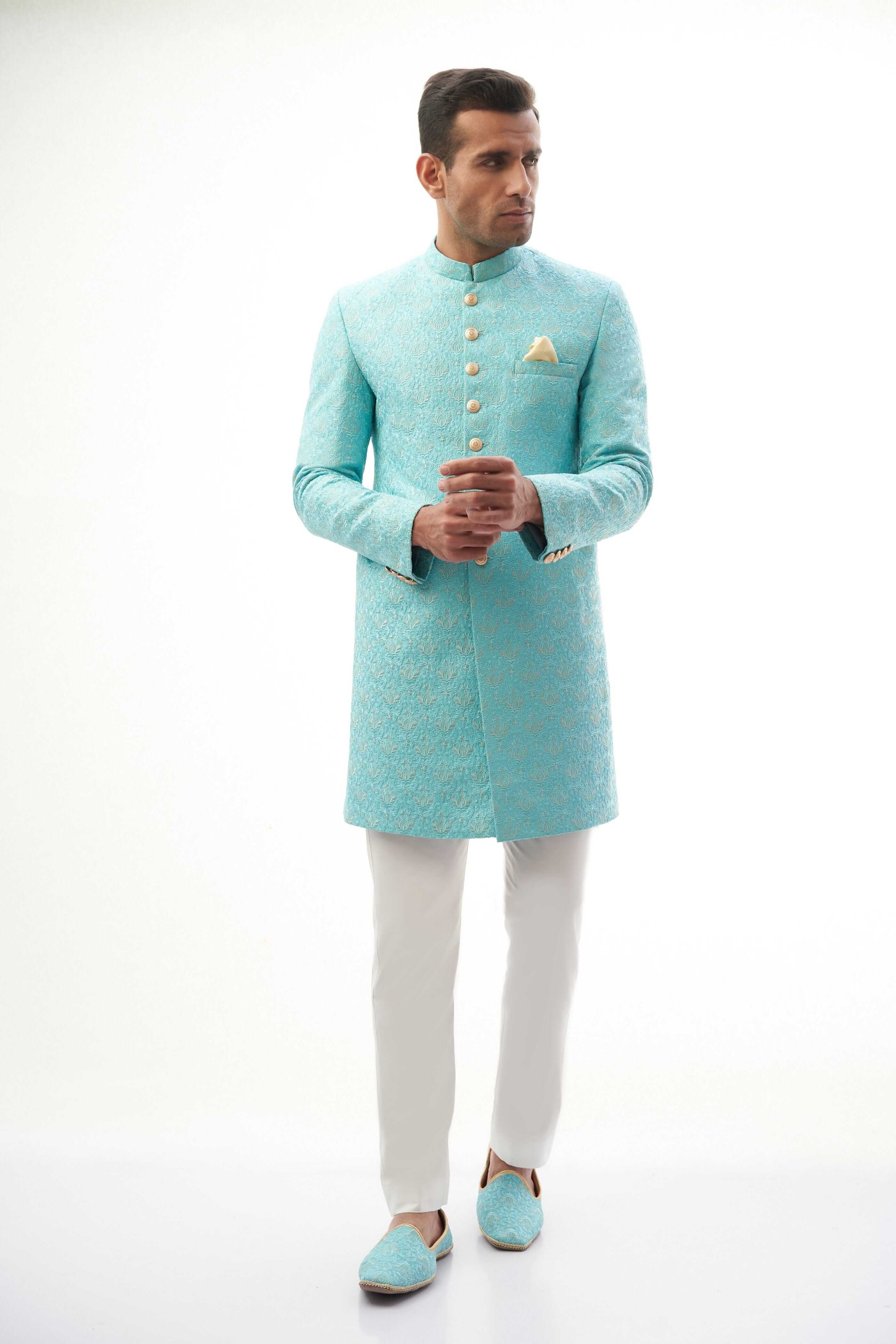 Sky Blue Rawsilk Sherwani with Resham and Gold Tilla Embroidery, Ideal for Weddings and Festive Occasions.