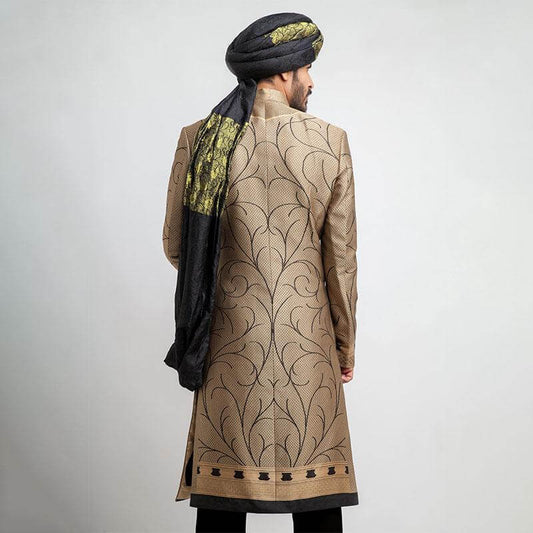 Antique gold and black brocade form-fitted sherwani with intricate embroidery, combining luxurious design and a modern tailored fit.