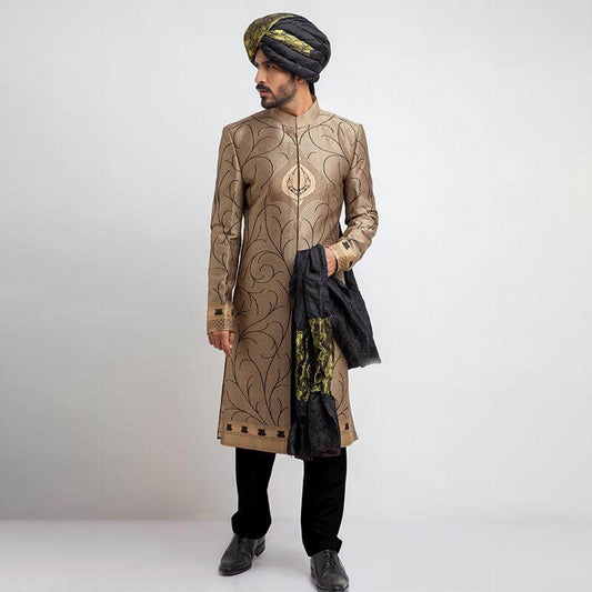 Antique gold and black brocade form-fitted sherwani with intricate embroidery, combining luxurious design and a modern tailored fit.
