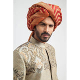 Ecru and grey brocade sherwani with a tailored fit, featuring intricate woven detailing for a regal, formal look.
