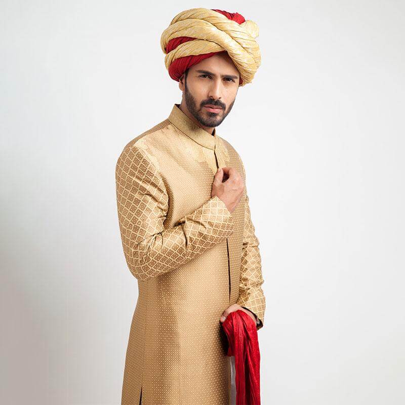 Peach Gold and Antique Gold Brocade Form-Fitted Sherwani with intricate detailing