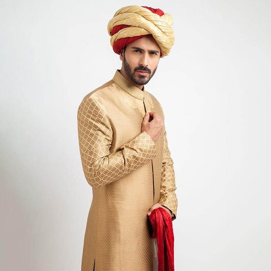 Peach Gold and Antique Gold Brocade Form-Fitted Sherwani with intricate detailing
