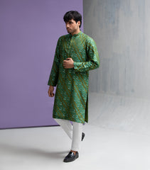 Parrot green cotton jacquard kurta set.
