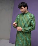 Parrot green cotton jacquard kurta set.