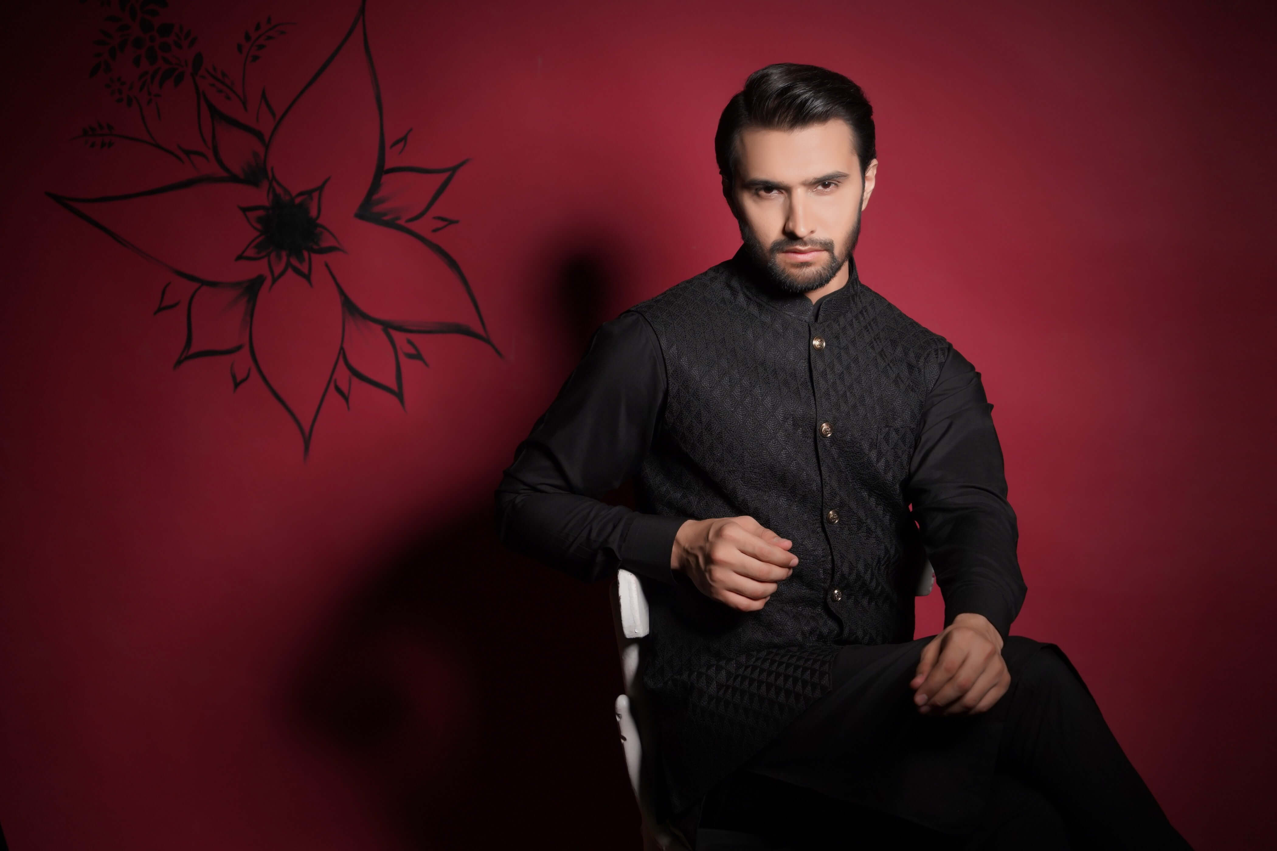 Arsalan Iqbal Jet Black Diamond Textured Embroidered Waistcoat Set Upper Body Seated View for Men