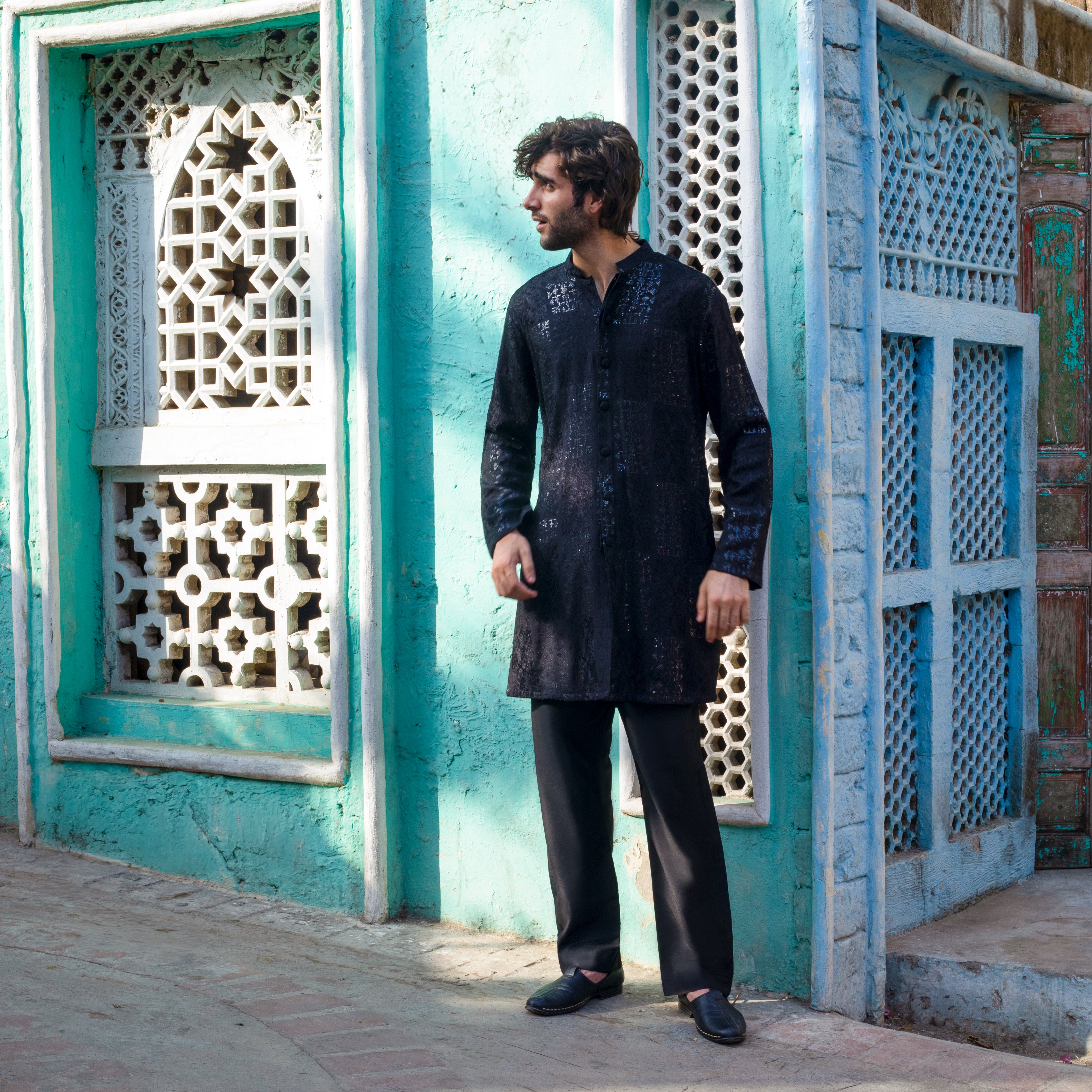 Arsalan Iqbal Shanzeh 3.0 Full Length Standing Pose Side Gaze Black Sequined Textured Kurta Pajama for Men   