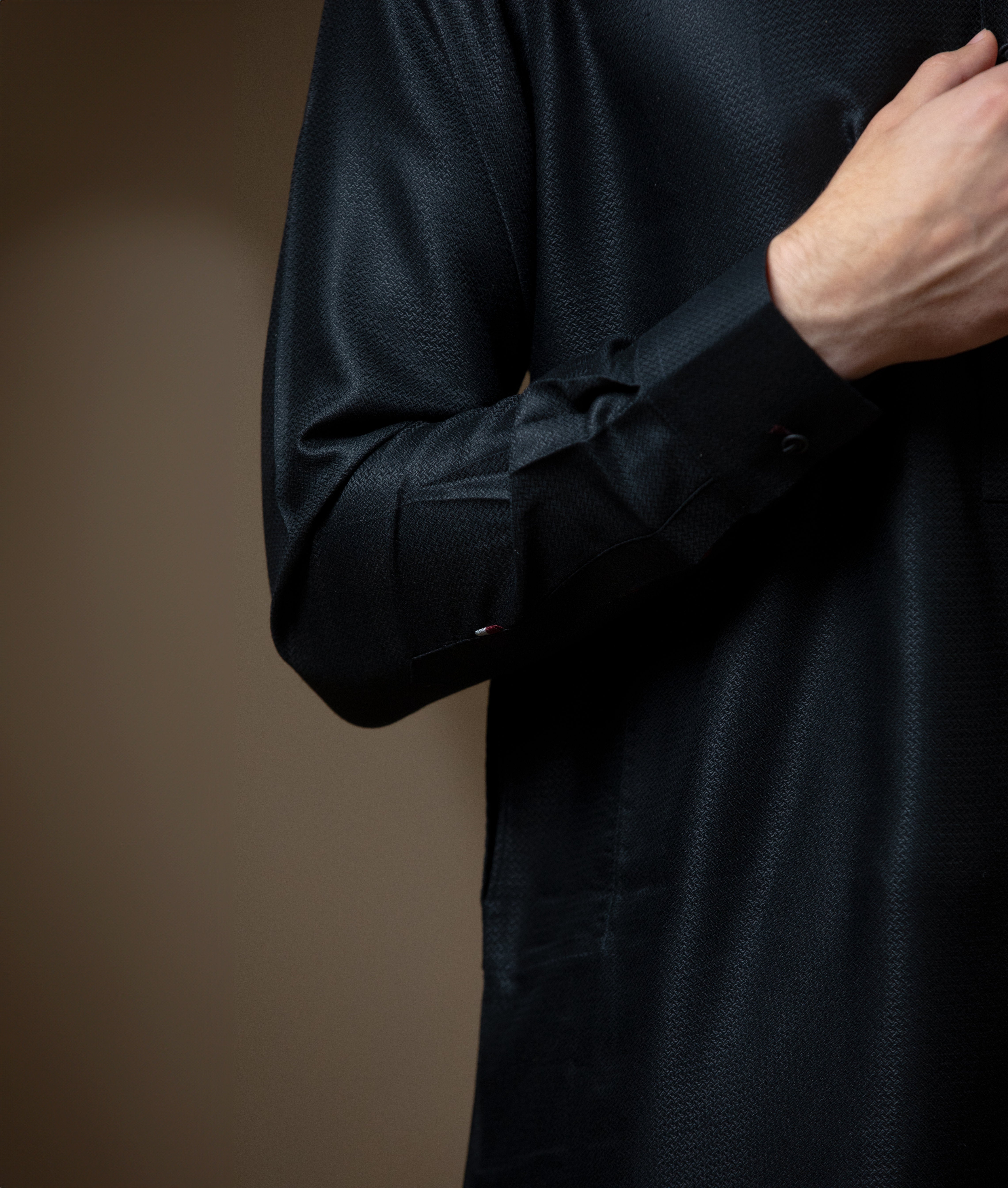Arsalan Iqbal Sooch'2026 Jet Black IronEZ Textured Kurta Sleeve Cuff and Fabric Texture Close-Up View for Men
