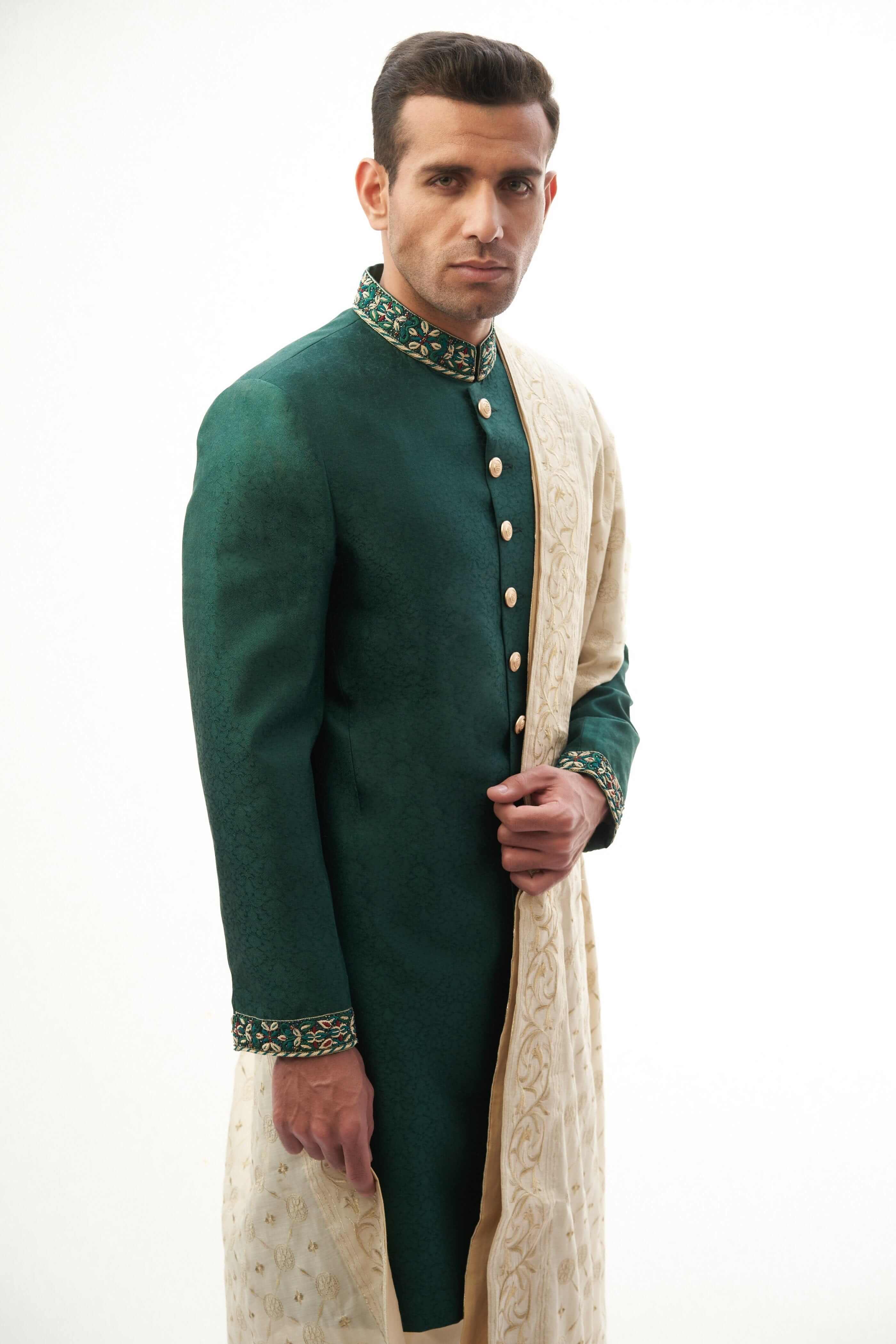 Emerald Green Brocade Silk Sherwani with Handcrafted Zardozi – Elegant and luxurious with intricate zardozi embroidery.