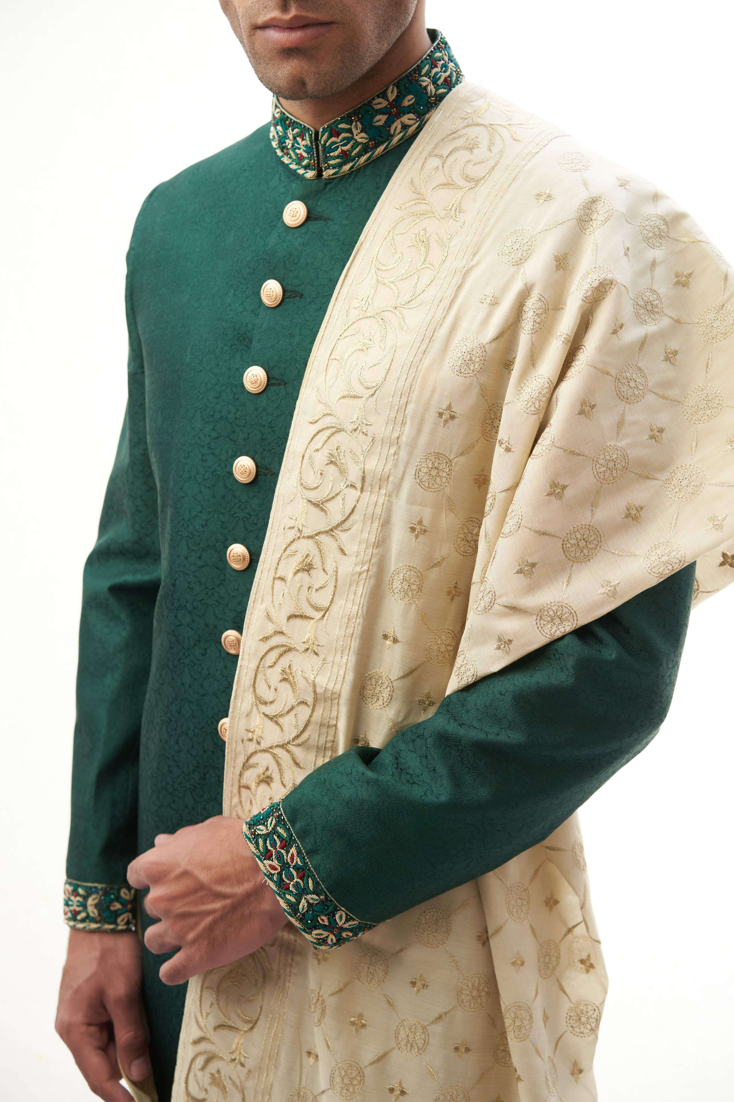 Emerald Green Brocade Silk Sherwani with Handcrafted Zardozi – Elegant and luxurious with intricate zardozi embroidery.
