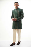  Emerald Green & Gold Short-Length Sherwani with Sequins – Elegant short-length sherwani featuring emerald green and gold colors with intricate sequin detailing.