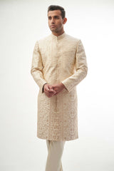 Fawn Persian Painting-Inspired Sherwani – Exquisite fawn-colored sherwani with intricate Persian painting-inspired embroidery for a royal look.