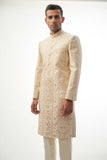 Fawn Persian Painting-Inspired Sherwani – Exquisite fawn-colored sherwani with intricate Persian painting-inspired embroidery for a royal look.