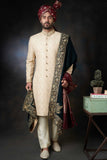  Gold Paisleys Rawsilk Sherwani with Velvet Shawl & Zardozi Adornments, Regal Wedding Attire.