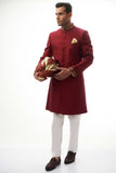 Maroon Brocade Silk Sherwani with Handcrafted Zardozi – Elegant maroon silk sherwani featuring intricate zardozi embroidery for a royal touch.