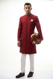 Maroon Brocade Silk Sherwani with Handcrafted Zardozi – Elegant maroon silk sherwani featuring intricate zardozi embroidery for a royal touch.