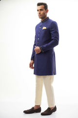 Navy Blue Brocade Silk Sherwani with Intricate Embroidery, Ideal for Weddings and Formal Events.