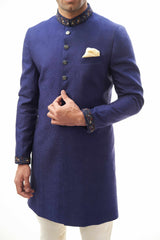 Navy Blue Brocade Silk Sherwani with Intricate Embroidery, Ideal for Weddings and Formal Events.