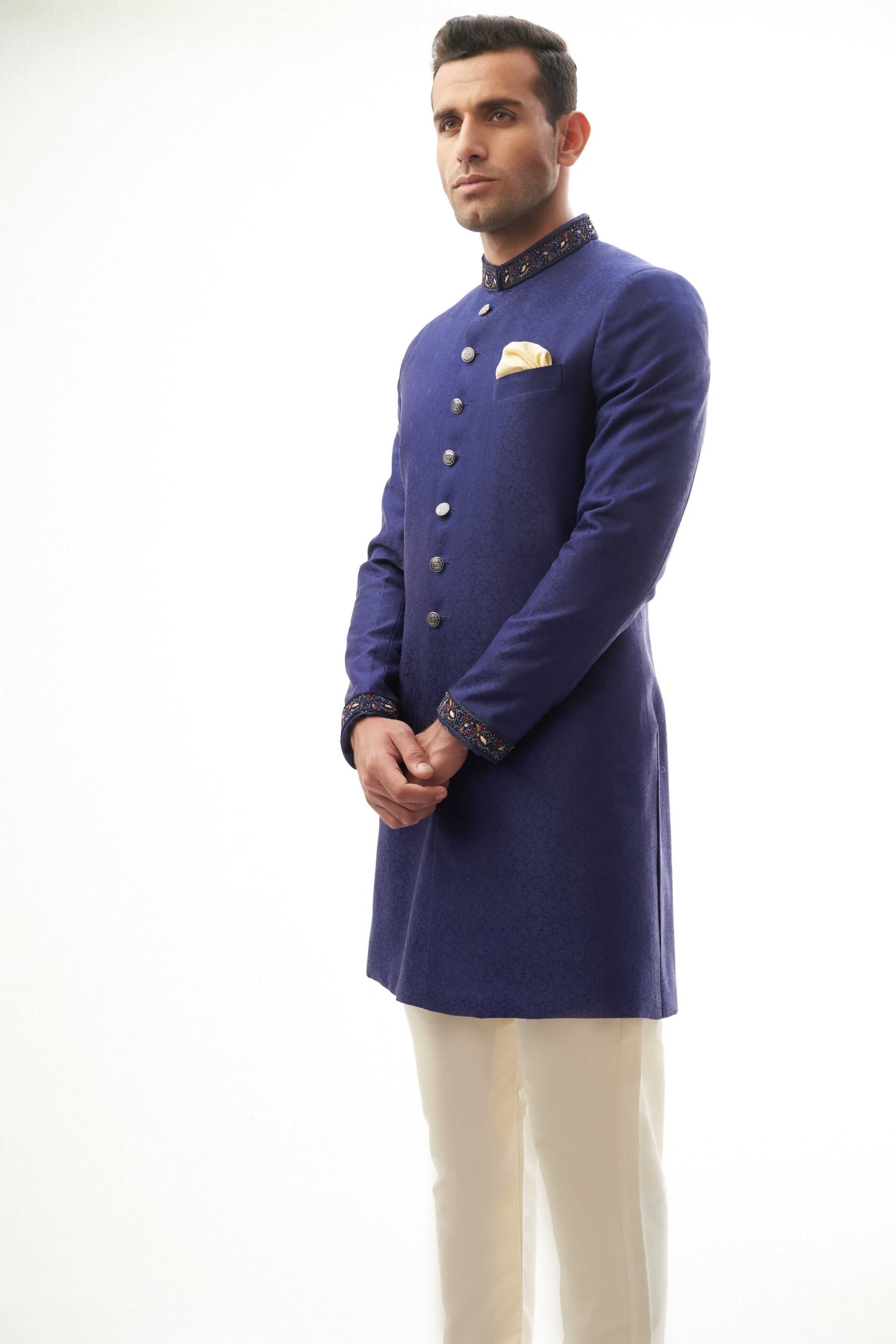 Navy Blue Brocade Silk Sherwani with Intricate Embroidery, Ideal for Weddings and Formal Events.