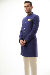 Navy Blue Brocade Silk Sherwani with Intricate Embroidery, Ideal for Weddings and Formal Events.
