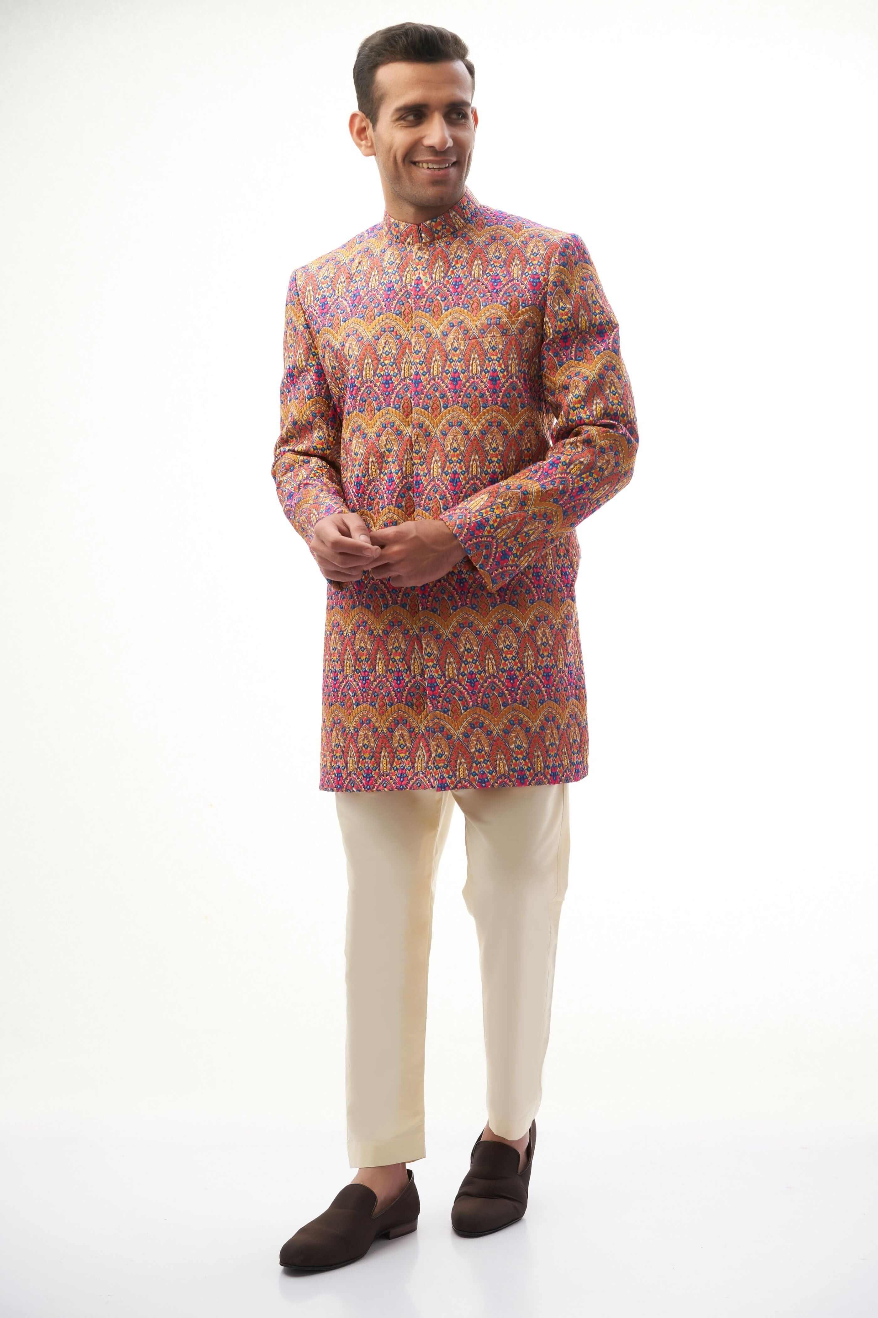  Rangeen-iye-Naubahar Multi-Colored Sherwani – Vibrant multi-colored sherwani featuring intricate designs for a traditional yet modern look