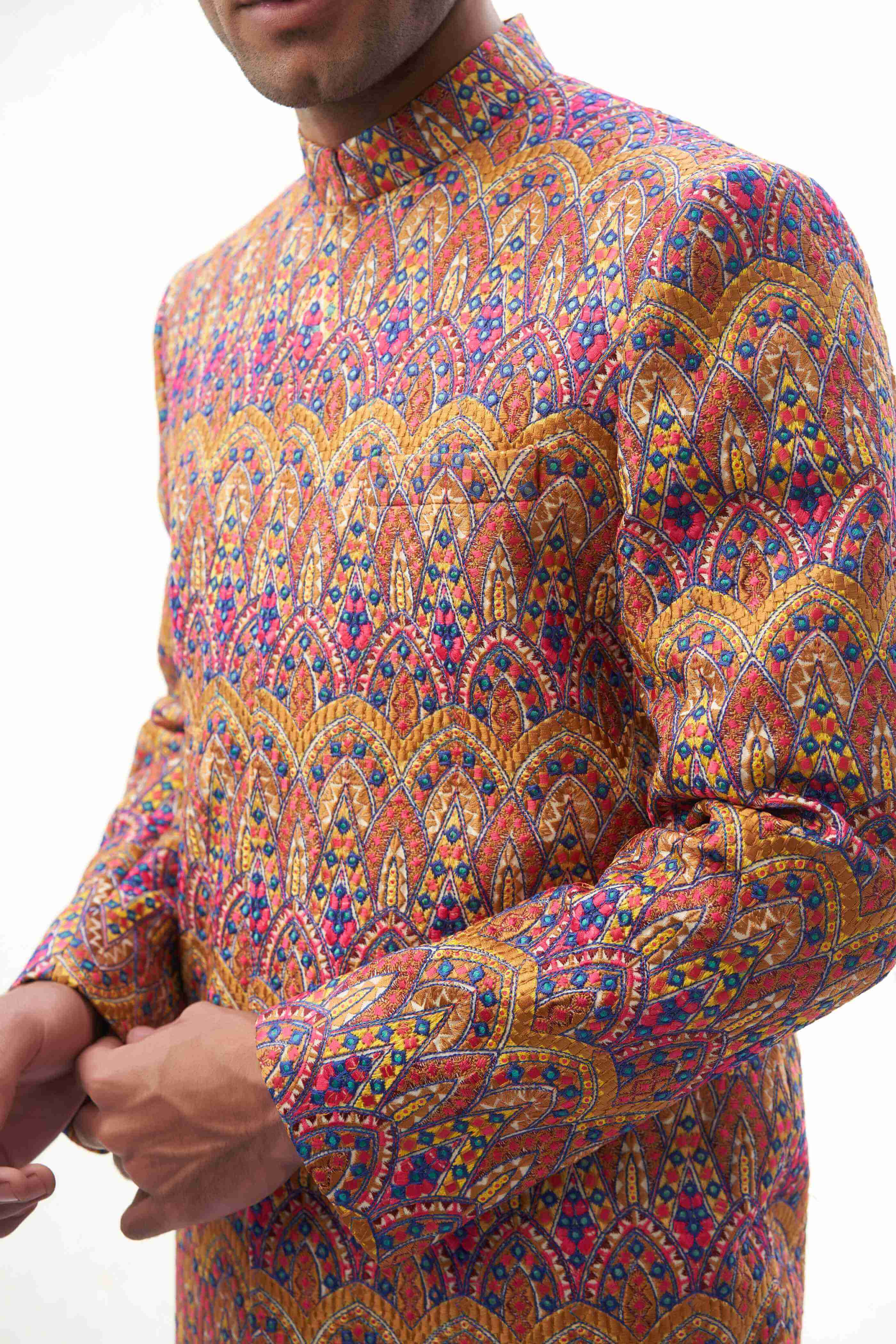 Rangeen-iye-Naubahar Multi-Colored Sherwani – Vibrant multi-colored sherwani featuring intricate designs for a traditional yet modern look