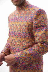  Rangeen-iye-Naubahar Multi-Colored Sherwani – Vibrant multi-colored sherwani featuring intricate designs for a traditional yet modern look