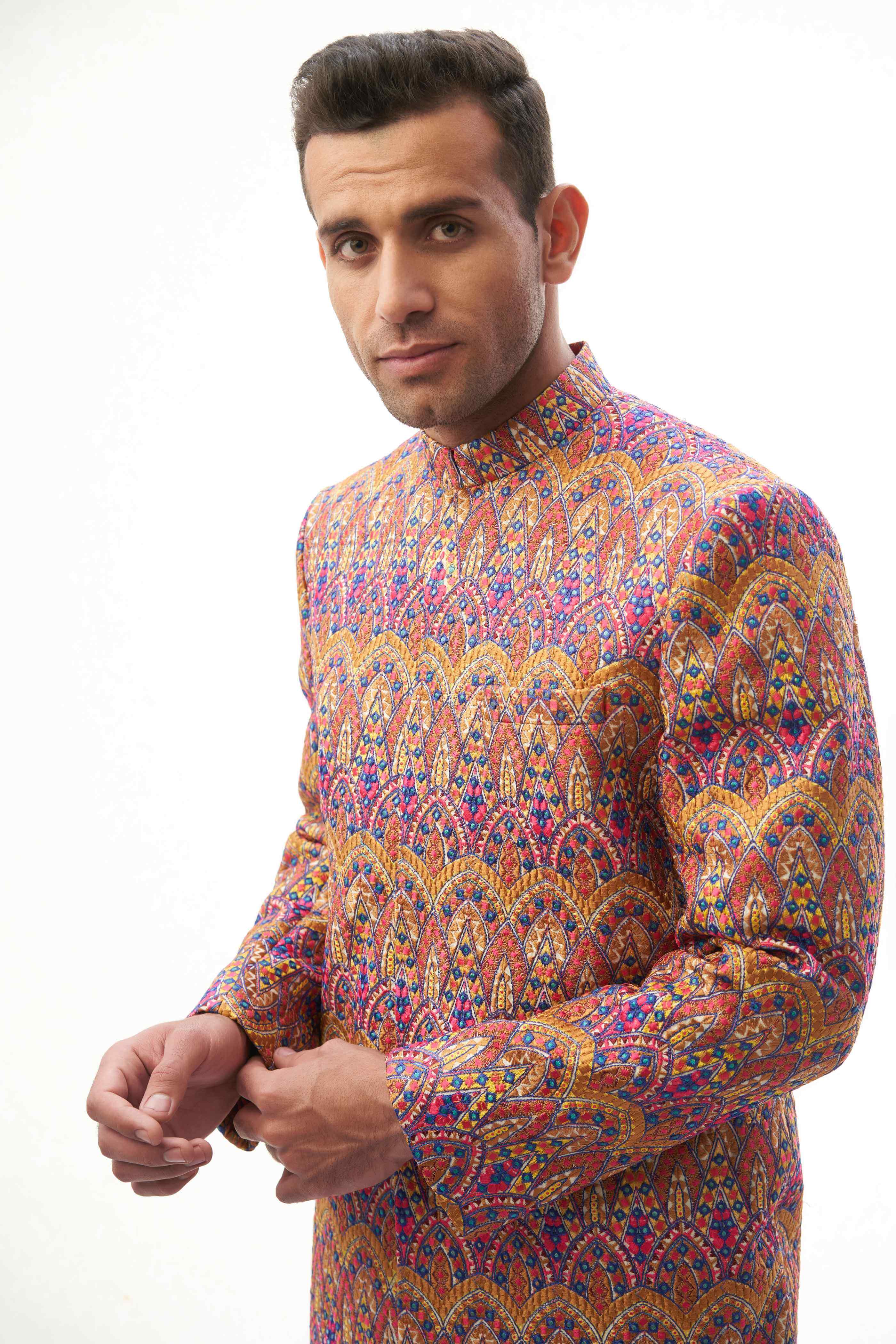  Rangeen-iye-Naubahar Multi-Colored Sherwani – Vibrant multi-colored sherwani featuring intricate designs for a traditional yet modern look