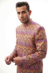  Rangeen-iye-Naubahar Multi-Colored Sherwani – Vibrant multi-colored sherwani featuring intricate designs for a traditional yet modern look