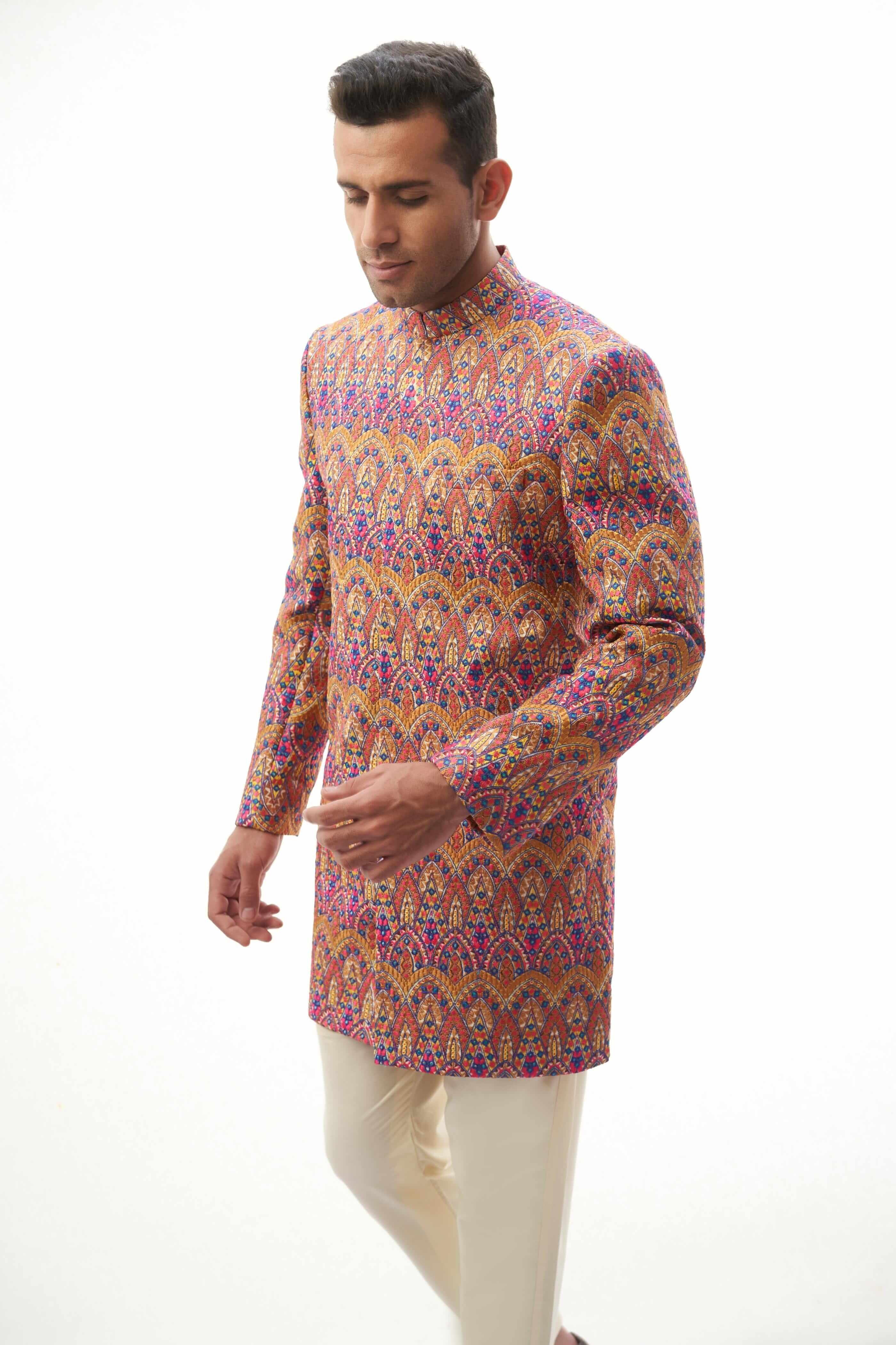  Rangeen-iye-Naubahar Multi-Colored Sherwani – Vibrant multi-colored sherwani featuring intricate designs for a traditional yet modern look