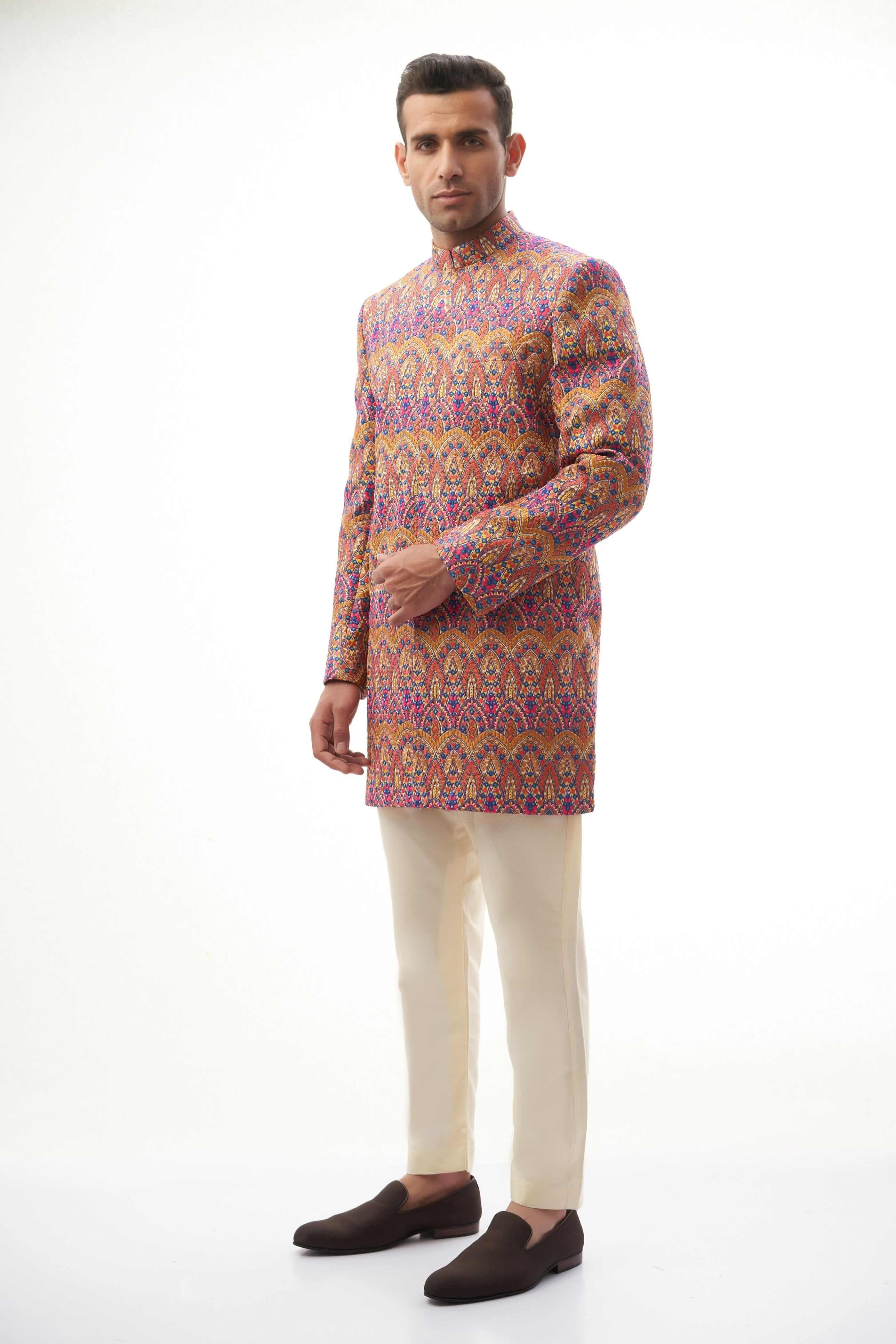  Rangeen-iye-Naubahar Multi-Colored Sherwani – Vibrant multi-colored sherwani featuring intricate designs for a traditional yet modern look.