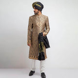 Antique gold and black brocade form-fitted sherwani with intricate embroidery, combining luxurious design and a modern tailored fit.