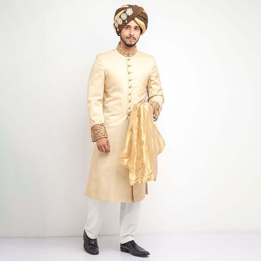 Arsalan Iqbal Cream Pure Jamavar Silk Form-Fitted Sherwani with Brown Turban and Gold Dupatta Full Length Front View for Men