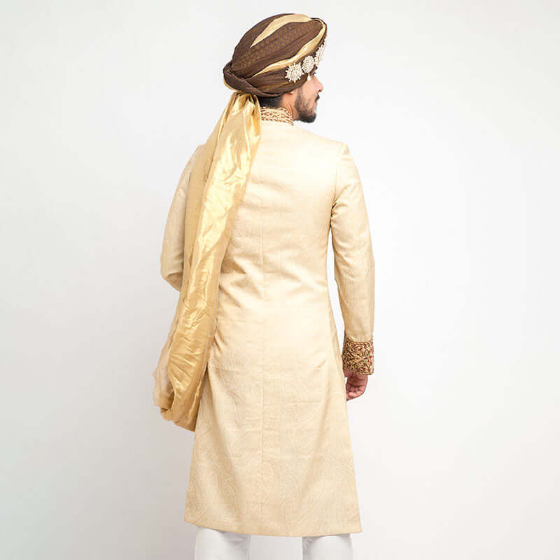 Arsalan Iqbal Cream Pure Jamavar Silk Form-Fitted Sherwani with Brown Turban and Gold Dupatta Back View for Men
