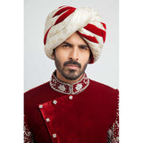Burnt red velvet form-fitted sherwani featuring intricate detailing and a luxurious finish by Arsalan Iqbal, perfect for formal occasions.
