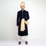 Elegant jet black cocktail sherwani in velvet with sleek form-fitted cut